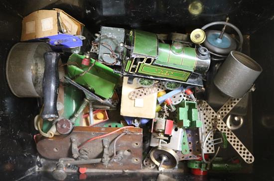 A tin trunk of toys, trains, etc.